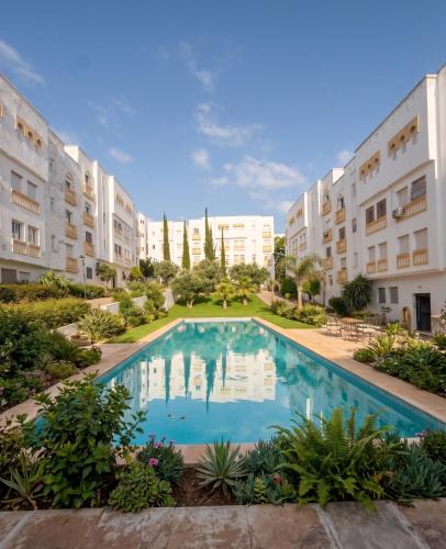 La Nouvelle Ville Ibn Batouta Apartment | Appartement Moderne en Residence Fermee avec Piscine A 5 min de la Plage et de l Aeroport