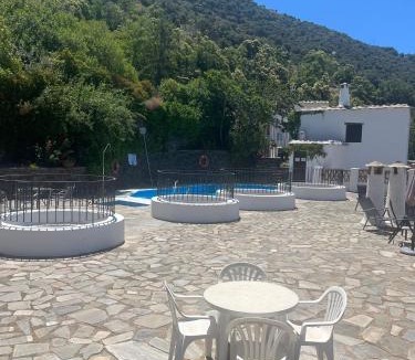 Bubion Apartment | Apartamento Rural Slow House Alpujarra - Piscina y chimenea