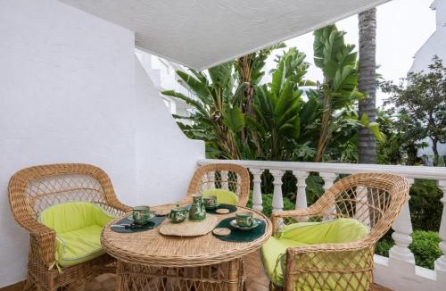 Urbanizacion Marbessa Apartment | Beach Access Apt in Playa Real Pool Terrace - Pass the Keys