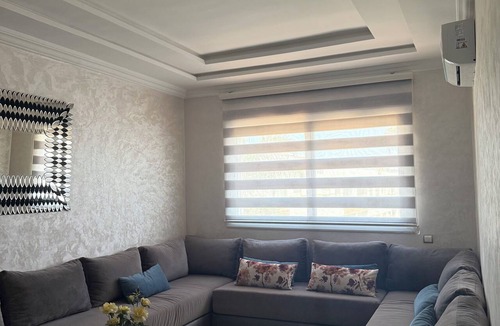 Harhoura Apartment | Bright apartment with a pool, 5-minute walk to the beach