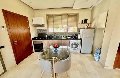 Tassoultante Apartment | Calm and modern oasis with garden and pool in Marrakech