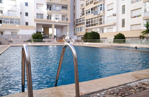Cite Al Mohammadi Apartment | Chic Designer Apartment with Pool Access