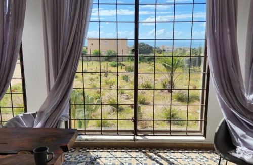 Ounagha Villa | Glass house