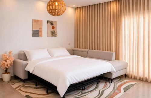Imi Ouaddar Apartment | Luxury Dark Boho, Direct Access to Beach, Private Balcony, Rooftop, Parking & AC