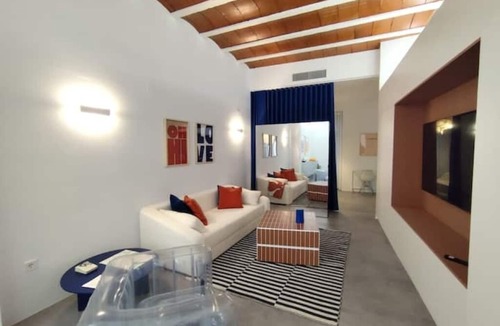 Santiago Apartment | Luxury Designer Loft in Cáceres Old Town | Steps from Plaza Mayor & Godoy Palace