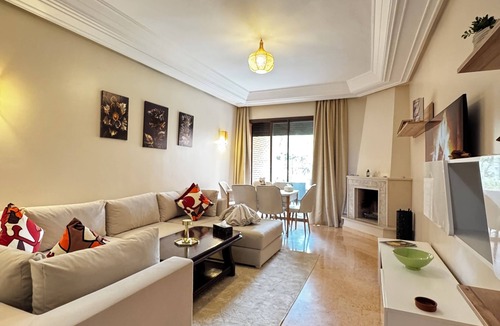 Agdal Apartment | Marrakech Oasis 2-bedroom apartment with direct garden and pool access with AC