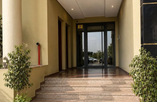 Cite Al Mohammadi Apartment | Modern Apt, Private Parking, Fast WiFi & Elevator