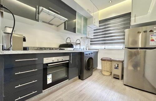 Al Bahraoyine Apartment | Peaceful 2 Bedroom Apartment with Swimming Pool