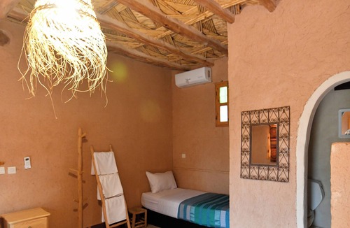 Tarmigt Bed & Breakfast | Room in a farmhouse with terrace and garden in the heart of the palm grove