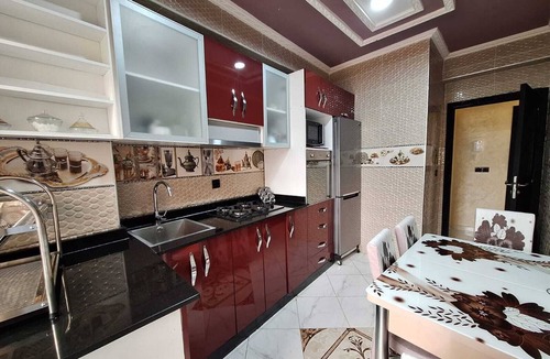 Mesnana Apartment | Secure family haven with Wi-Fi and amenities