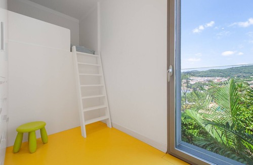 Canet de Mar Villa | Villa 'Las Palmeras' for families only with private pool, Wi-Fi and air conditioning