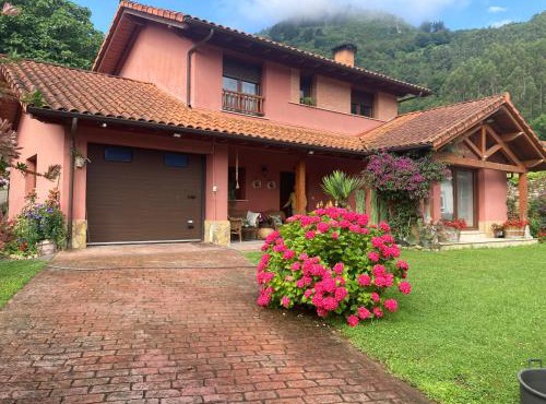 Casa roja in Marrón