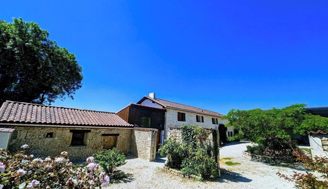 Charente rustic farmhouse with heated pool and wonderful views, sleeps 13. in Val D'Auge