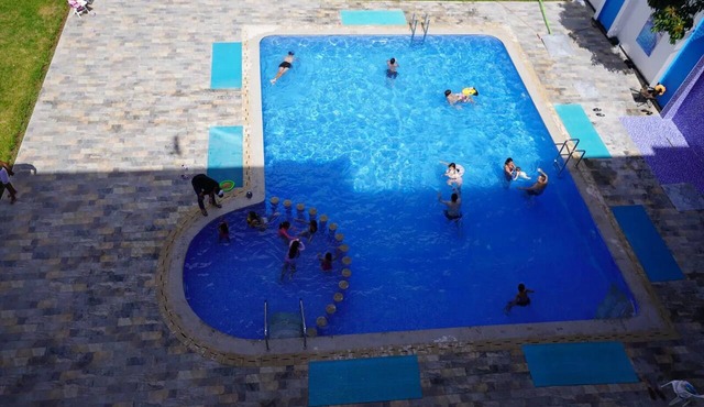 Charming 2-Bedroom Apartment with Pool View and Balcony