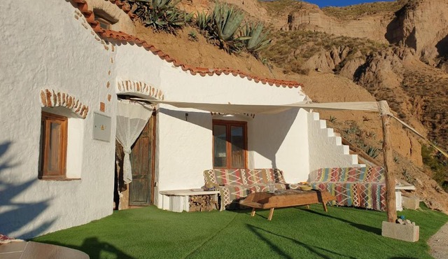 Creatively designed CaveHouse with jacuzzi in Gorafe