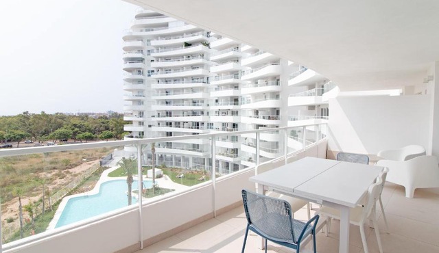 Global Vacacional, Apartamento con terraza, vistas al mar y a la piscina in Canet de Berenguer