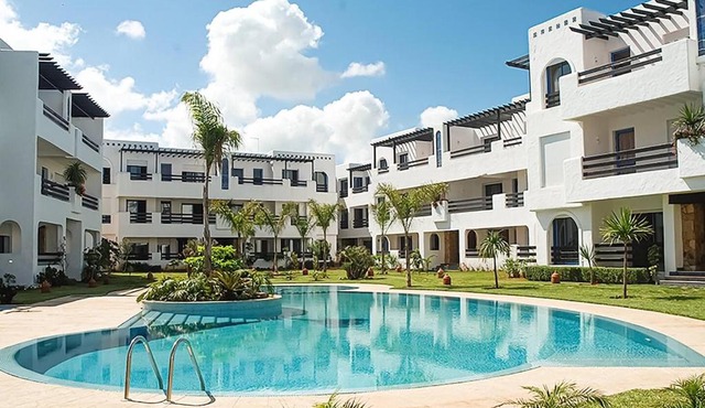 MOU - Appartement moderne 2 chambres avec piscine à Skhirat Plage