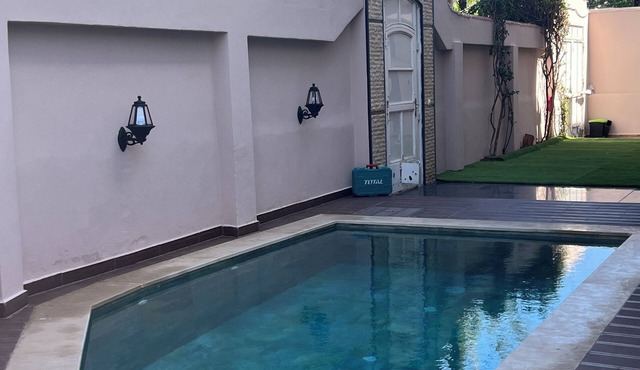 Spacious 4-bedroom villa in enchanting Tanger with AC comfort