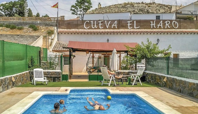 This charming cave house, restored in a traditional style while offering the comforts of a modern ho in Baza