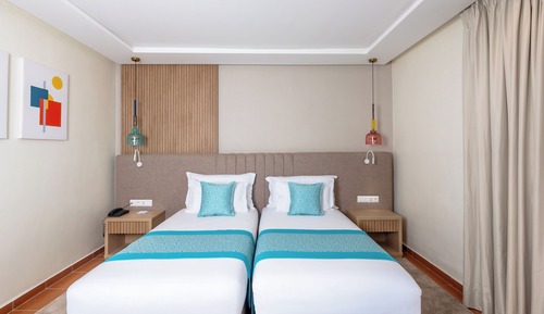 Deluxe Room King Twin Beds Pool View