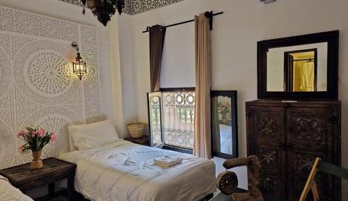 Double Room (1 Adult + 1 Child)