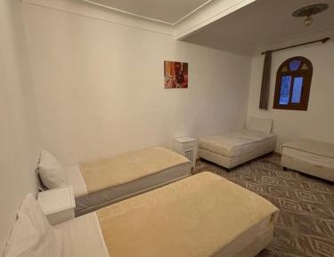 Quadruple Room with Private Bathroom