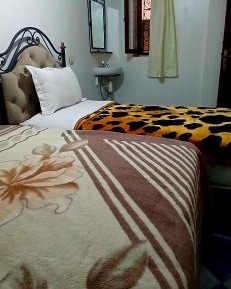 Economy Triple Room with Shared Bathroom