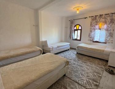 Quadruple Room with Private Bathroom