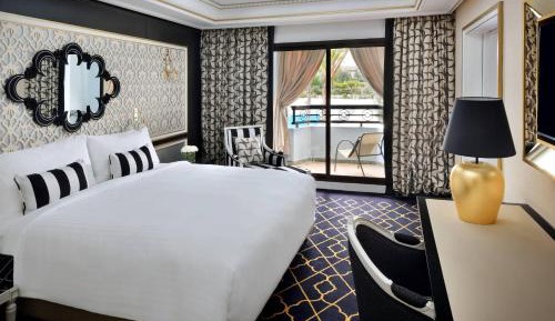 Junior Suite, 1 King, Sofa bed, Garden & Pool view, Balcony