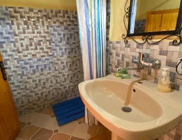 Quadruple Room with Private Bathroom