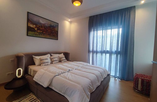 Tamrhakht Apartment | Cozy 1 bedroom apparemment with private terrace, golf and ocean view