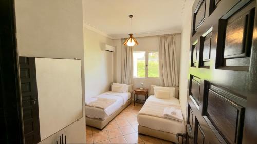Tamariss Apartment | Seaside Apartment - Sea View - Garden - Dar Bouazza