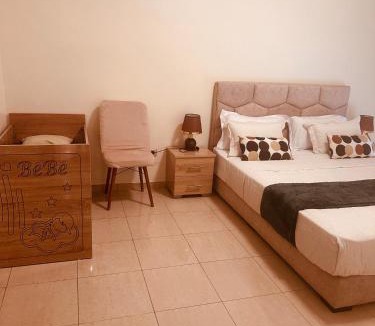 Cite Al Mohammadi Apartment | Your Summer Escape Spacious twoBedroom and Sunny Pool