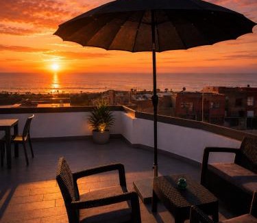 Imi Ouaddar Apartment | Luxury Dark Boho, Direct Access to Beach, Private Balcony, Rooftop, Parking & AC