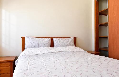 Martil Apartment | Spacious Family Apartment - Air Conditioning, Pool & Garden Views