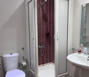Martil Apartment | Spacious Family Apartment - Air Conditioning, Pool & Garden Views