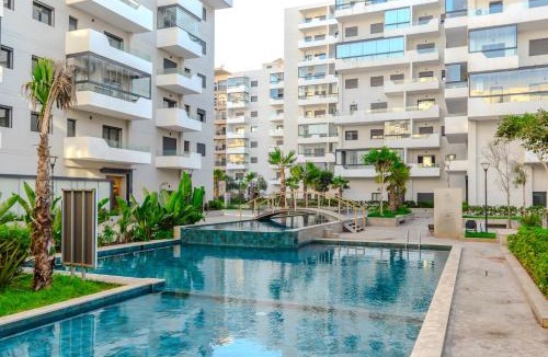 Ain Harrouda Apartment | VIVASTAY Casablanca - Ocean Park Sunset Escape beach front with swimming pool