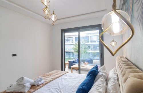 Tamariss Apartment | Beachfront gem with pool gym