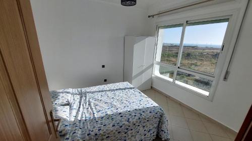 Achakkar Apartment | Appartement avec piscines, vue sur mer et accès à la plage à Achakar Hill, Tanger.