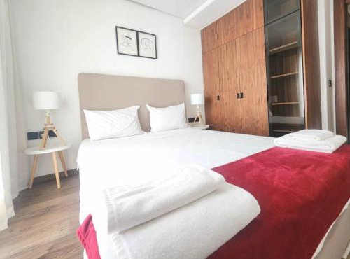 The Fifteen Triangle d'Or by IB Signature - Chic 1BR, Rooftop Pool, Wifi, Self Check-in, Day and Night Security, Terrace, free parking close to all amenities