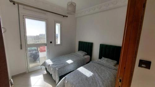 Appartement 3 avec piscines, vue mer et accès à la plage à Achakar Hill, Tanger