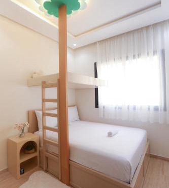 Le Doux Nuage de Tanger - Cosy appart, Résidence Securisée avec Piscine, Jeux pour enfants et Terrain de foot, Parking, AC, WIFI, IPTV in Tangier