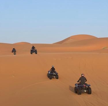 Moda Camp merzouga tours Quad Sunboarding ATV in Merzouga